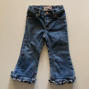 Little girls flared ruffled jean.